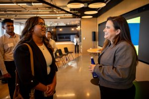 Allie Miller speaks with a Break Through Tech Fellow after the event.